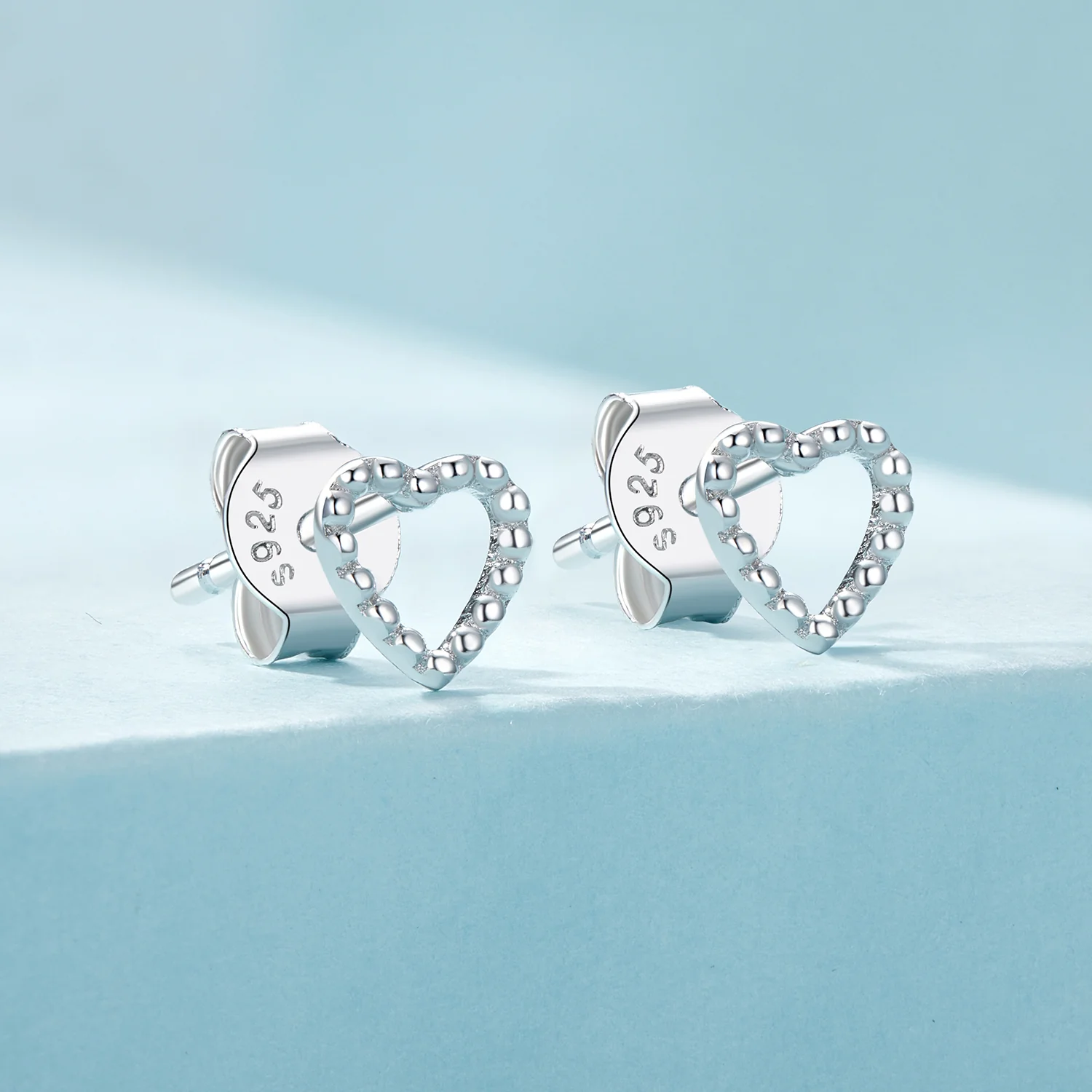 Gnoce Mini Heart Stud Earrings - Image 2